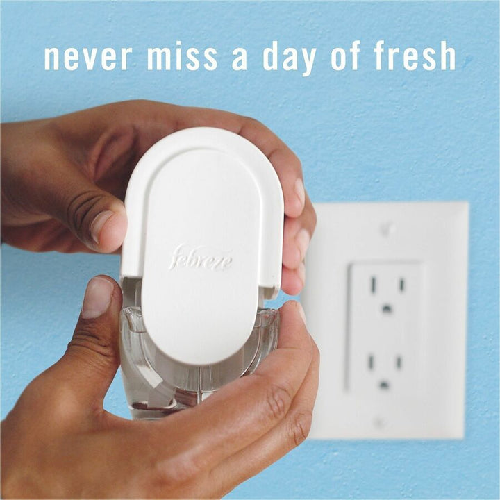 Image of Febreze 13844 FadeDefy PLUG Air Freshener, 2.63 oz, April Fresh, 50 Day, Odor Neutralizer, 3 / Pack