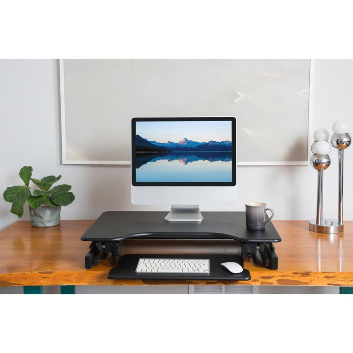 Image of Lorell Desk Riser, Sit-Stand, 40 lb. capacity, 34-1/2"x27"x9", BK