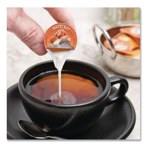 Image of International Delight® WWI02283 Flavored Liquid Non-Dairy Coffee Creamer, Hazelnut, 0.44 oz Mini Cups, 48/Box